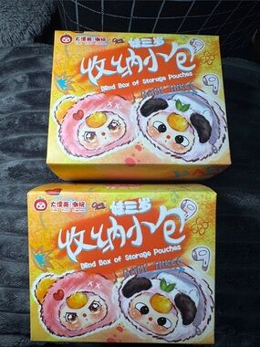 2/ Brand New, Sealed Baby Three Blind Box Of Storage Pouches.